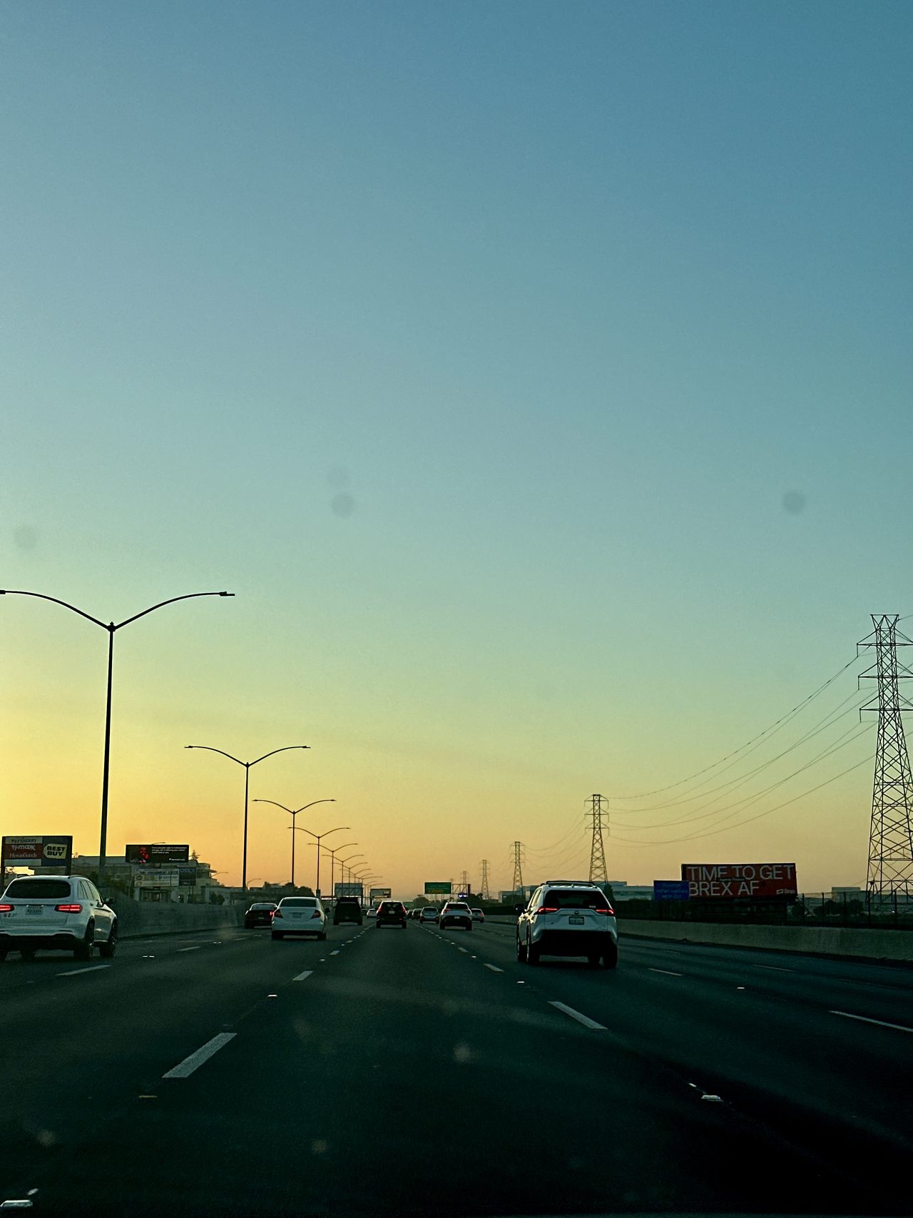 Freeway light, and a billboard yelling about corporate cards.